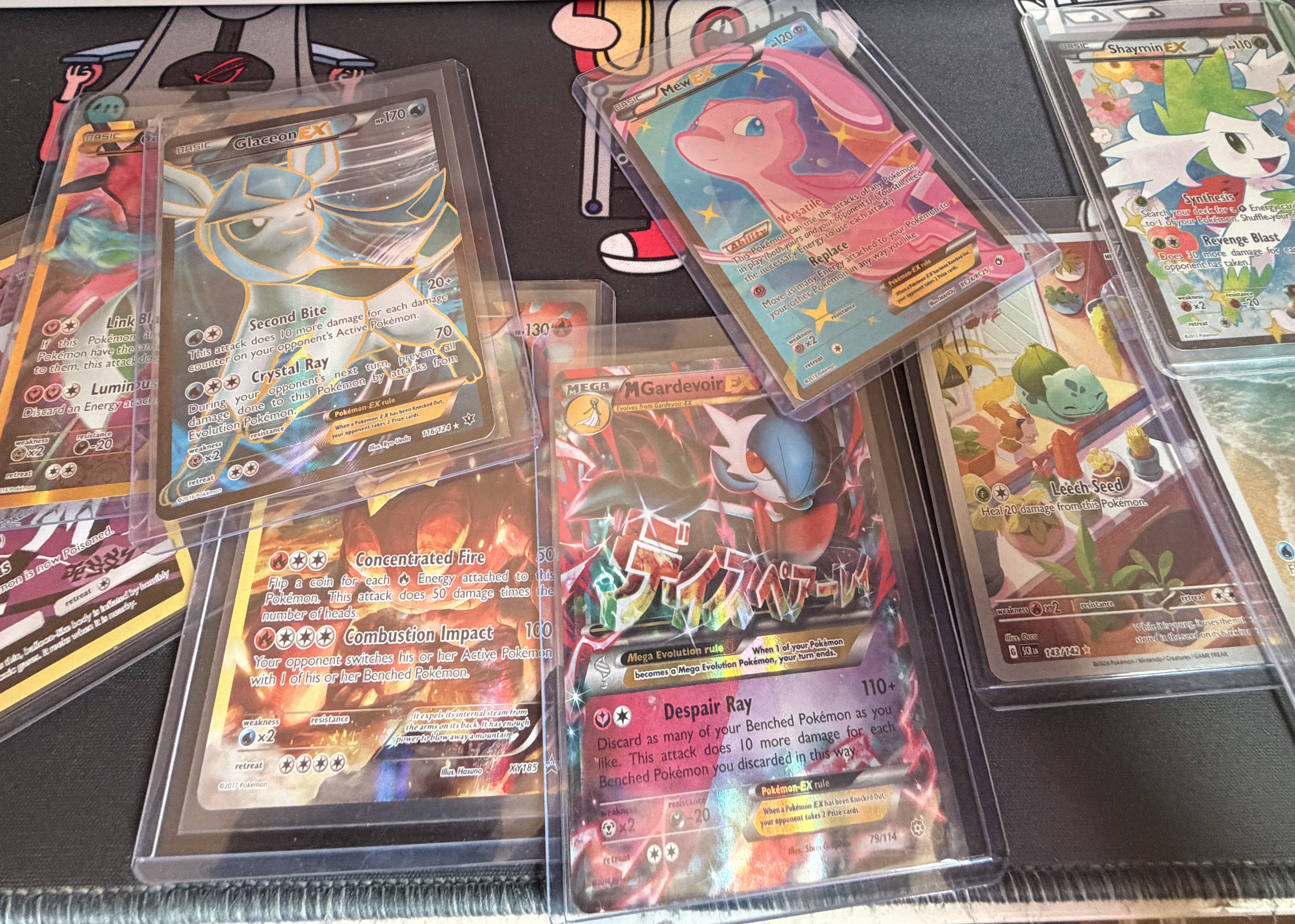 Charizard and Mew cards